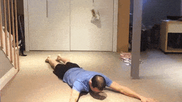 prone arm rotations image - thoracic spine mobility exercise