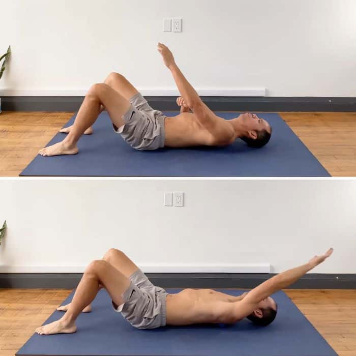 Person lying on floor using a tennis ball under the mid-back for muscle release