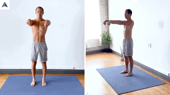 Both arms straight with fists clenched and wrists flexed downward to stretch forearms.
