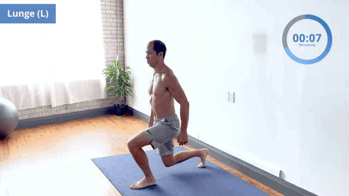Static lunge with left leg forward, torso upright, and glute engaged.